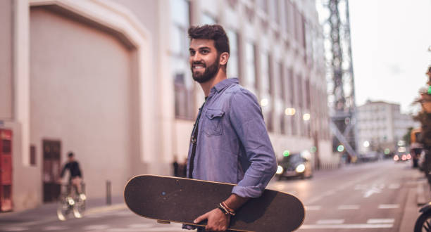 istock Handsome skater in city 812834134