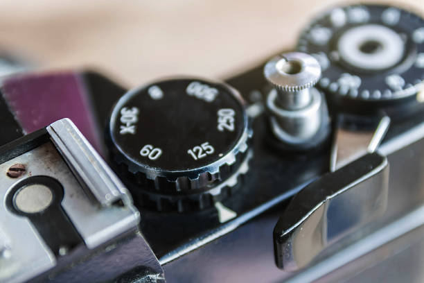 istock Old film camera, The wheel of choice shutter and shutter button, 812852778