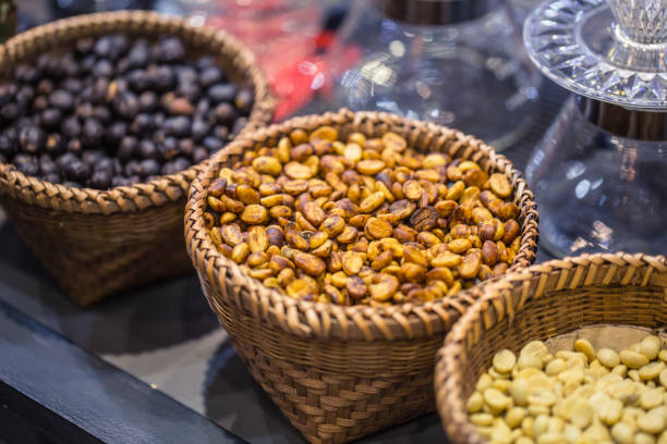 istock various type of rosted coffee bean compare of rost time from white to dark color. 812888654