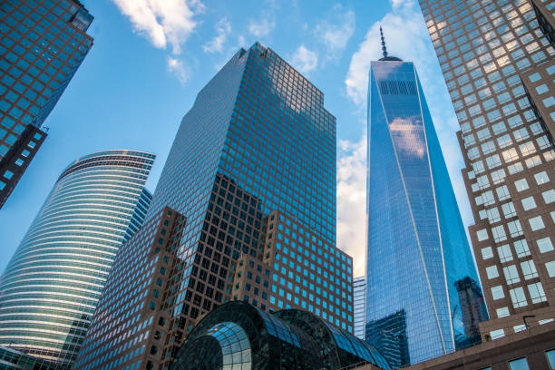 Corporate Buildings - Brookfield Place, World Financial Center and One World Trade Center - Low Angle View, Looking Up at Skyscrapers Corporate Buildings - Brookfield Place, World Financial Center and One World Trade Center - Low Angle View, Looking Up at Skyscrapers financial district stock pictures, royalty-free photos & images