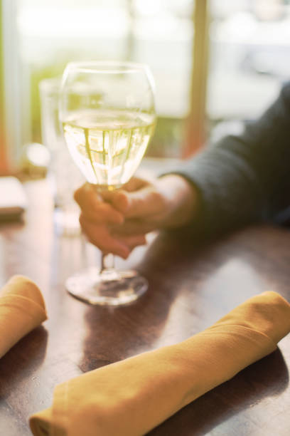 istock Glass of wine in restaurant 812925522