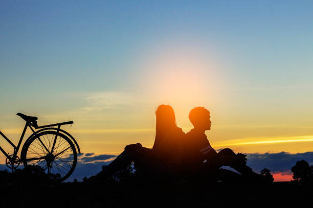 istock Young teens at the sunset. 812927690