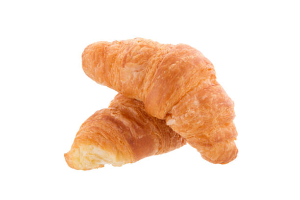 istock Freshly baked croissants isolated on a white background 812942112