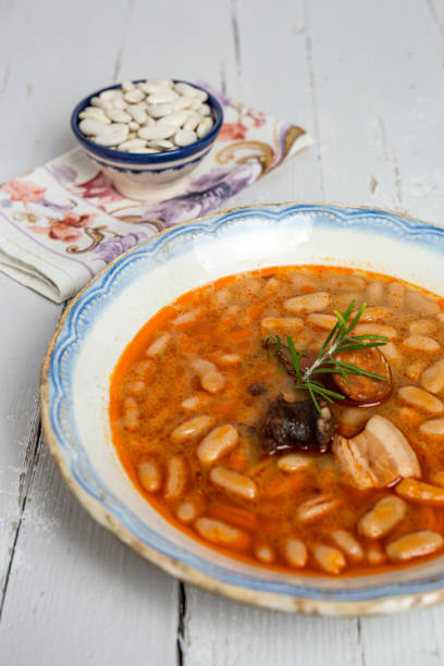 istock Stew of beans with chorizo and pork 812948248
