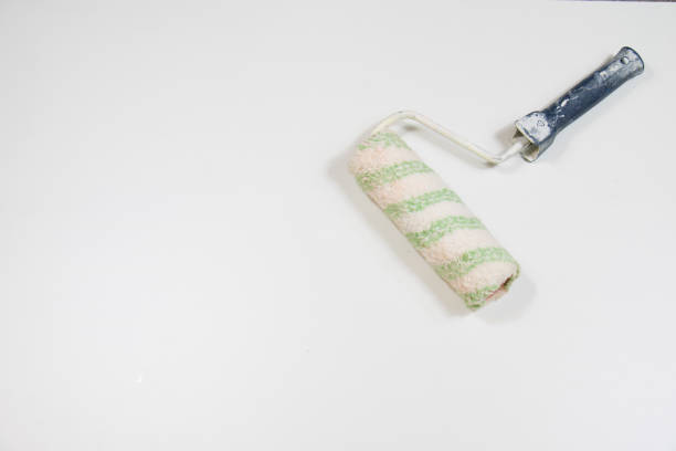 istock Roller and paint brush on a white background. Painting tools 812952056