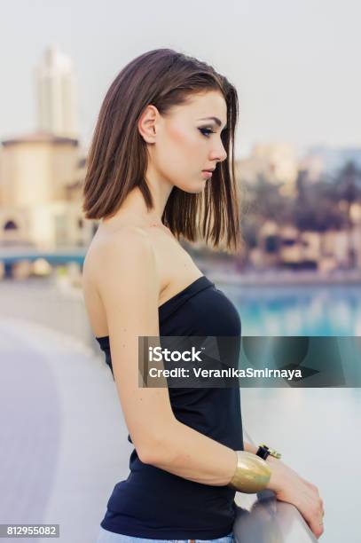 Vertical Portrait Of Young European Woman In Black Top Stock Photo - Download Image Now