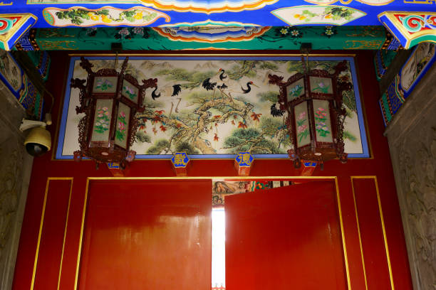 istock Gateway with red Chinese doors 812958064