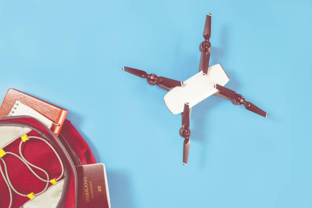 istock packing drone for vacation travel on blue background 812961110