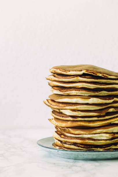 istock Delicious pancakes on white background. Morning and breakfast concept 812973184