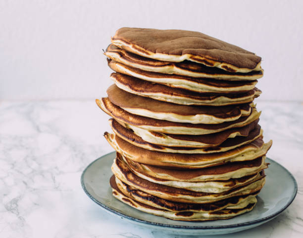 istock Delicious pancakes on white background. Morning and breakfast concept 812973252