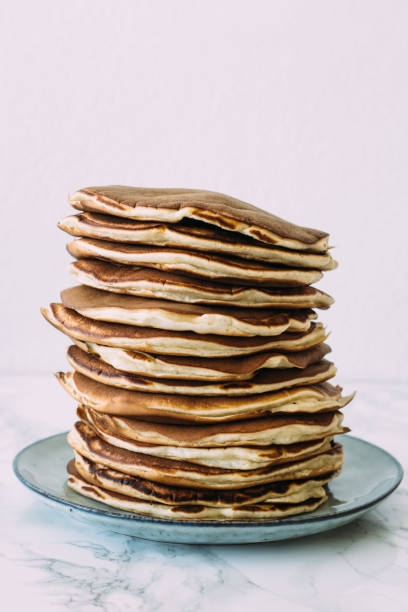 istock Delicious pancakes on white background. Morning and breakfast concept 812973290