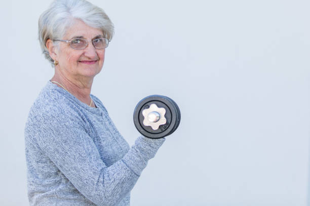 istock senior woman exercising 812973408