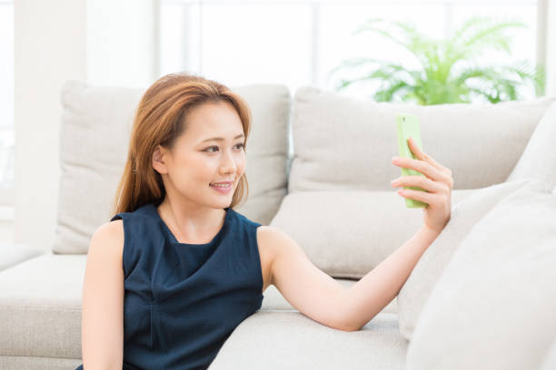 istock woman to see a smart phone 812983472