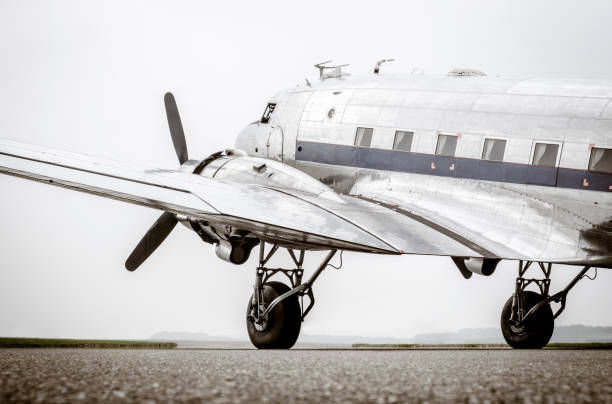 istock Vintage Douglas DC-3 propellor airplane ready for take off 812990576