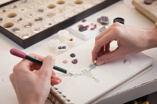 Jeweler at work, crafting in a jewelry workshop.