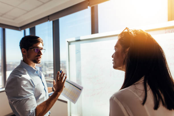 istock Entrepreneurs in office discussing business ideas. 813002322