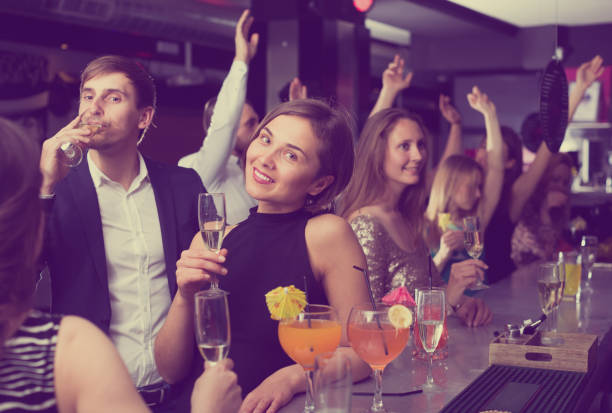 istock Guys and girls drink alcohol 813002492