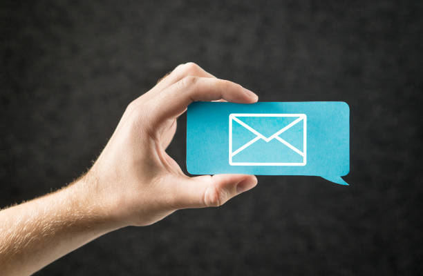 istock Contact us, send email and message banner for business website. Customer service and subscribe newsletter. Hand holding cardboard paper speech bubble and chat balloon with letter envelope icon. 813024782