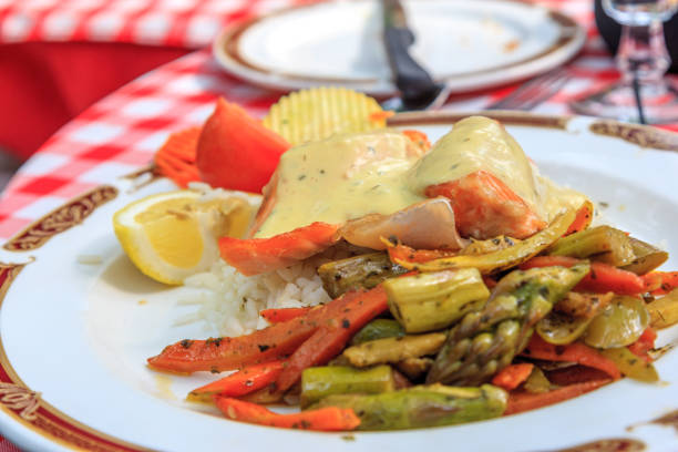 istock Salmon and vegetables lunch 813025750