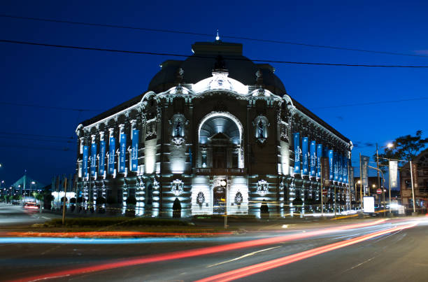 Belgrade, Serbia - July 9, 2017: Belgrade Waterfront project gallery in Savamala, the former building of Geozavod, built between 1905 and 1907, reconstructed in 2014. Night shot with traffic in motion blur