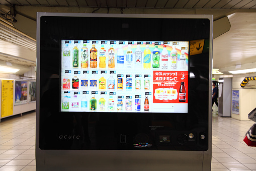 Tokyo, Japan - July 9, 2017: Latest model of Vending Machine taken in Ueno Station. Consumers are able to select their drinks by touching  digital panel. Currently, this model is available in lot of JR line stations in Japan. Japan is famous for the numbers and varieties of Vending machines.