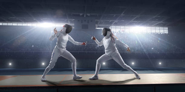 istock Female fencer fight on big professional stage 813058448