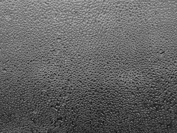 istock Glass with water drops close-up 813061778