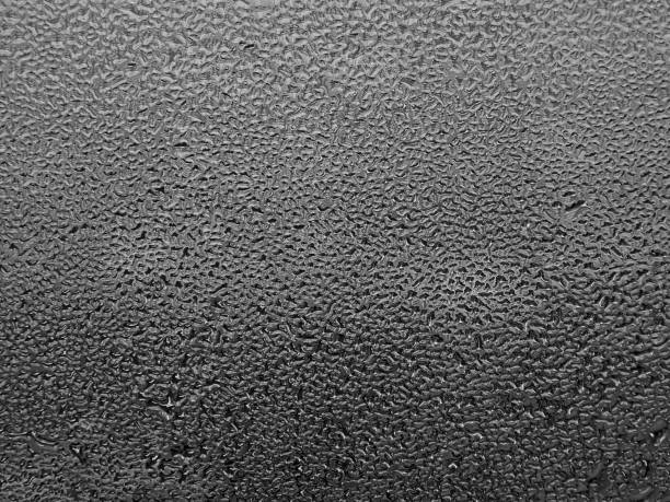 istock Glass with water drops close-up 813061824
