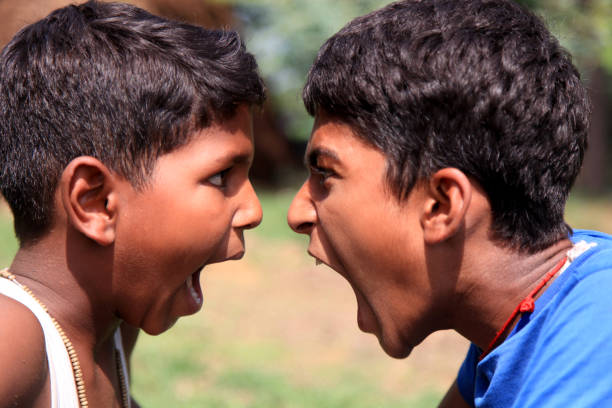 istock Angry men yelling to each other 813062488