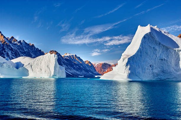 istock iceberg floating in greenland fjord 813068348