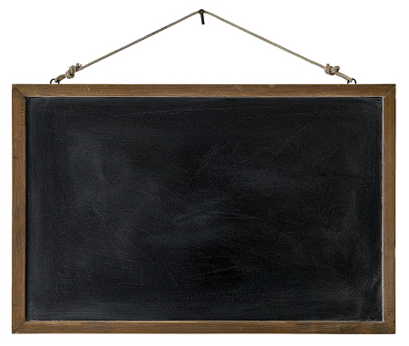 An old wooden framed blackboard hangs from a rusty nail, isolated on white, clipping path included. Good copy space with lots of rustic character.
