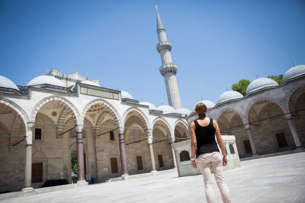 istock Female tourist visiting Mosque in Istanbul 813074232