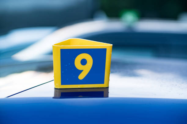 istock Number one plastic sign on motorhood from car in service 813078382