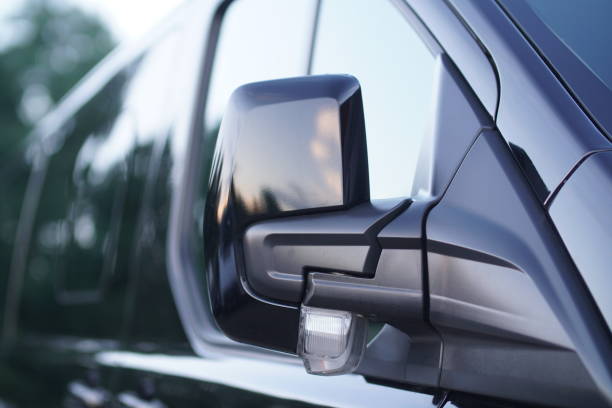 istock Side Mirror from the new blue delivery van 813078726