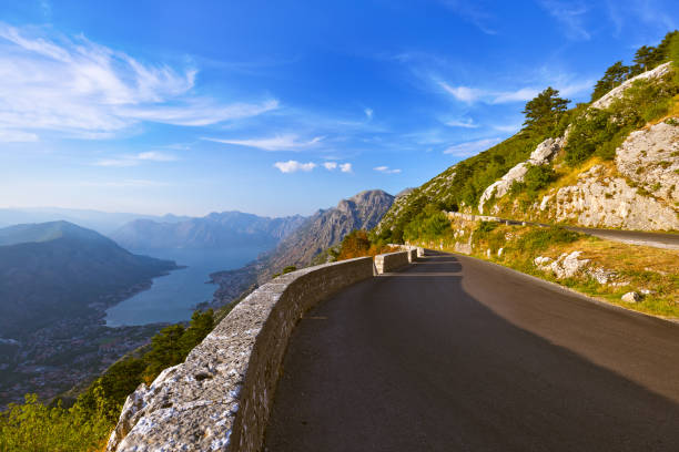 istock Mountains road and Kotor Bay on sunset - Montenegro 813082534