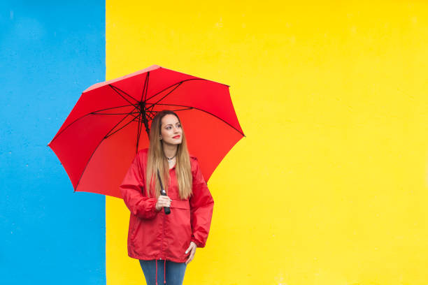 istock Young woman and colourful  wall 813087280
