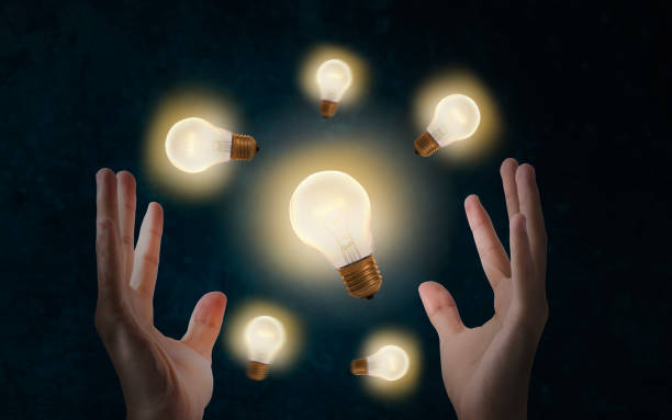 istock hand holding light bulb. concept of new ideas with innovation and creativity. 813087412