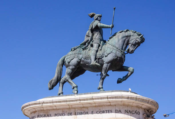 istock Monument and statue on the Figueira Square in Lisbon 813099804