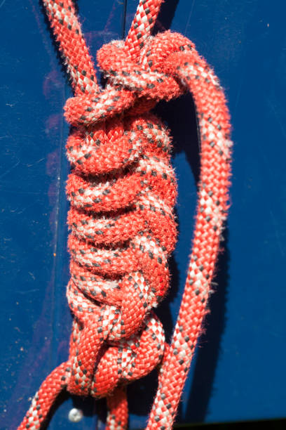 istock red and white rope with knots 813107914