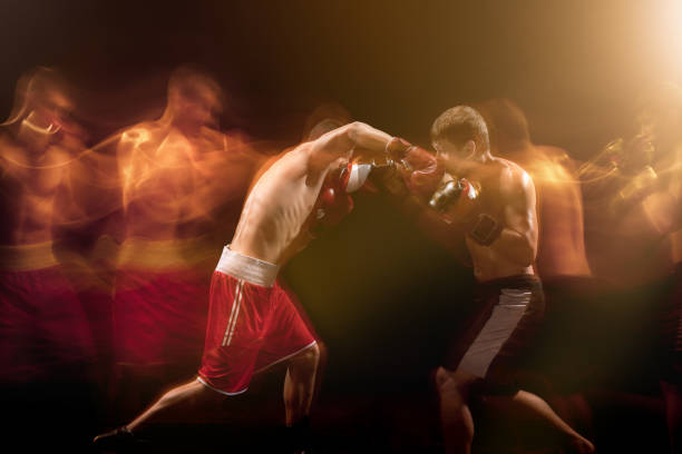 istock The two male boxers boxing in a dark studio 813118032