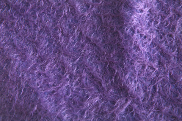 istock Texture of purple angora woolen cloth 813121208