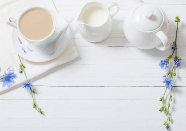 istock Drink from chicory in a cup on the white wooden table 813131740