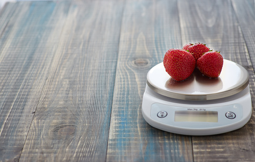 Strawberry on the scales