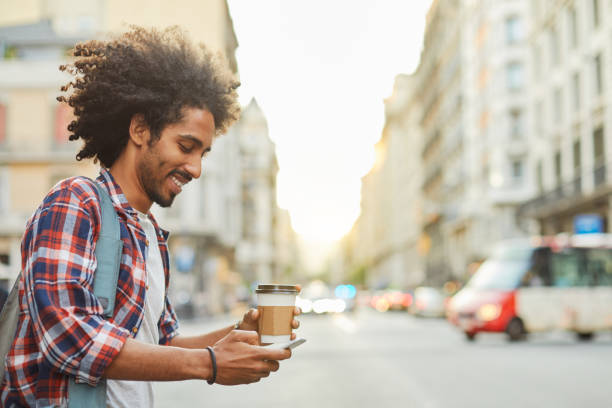 Young trendy man in Barcelona. Young trendy man in Barcelona. Business on the go, technology, millennials lifestyle. hipster car stock pictures, royalty-free photos & images