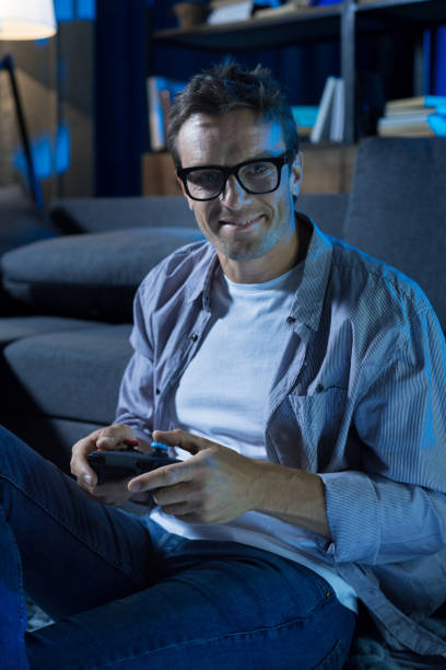 istock Eccentric fun guy enjoying his quiet leisure at home 813139714