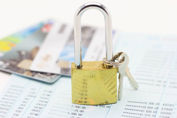 istock Credit card data security concept padlock with book bank 813141096