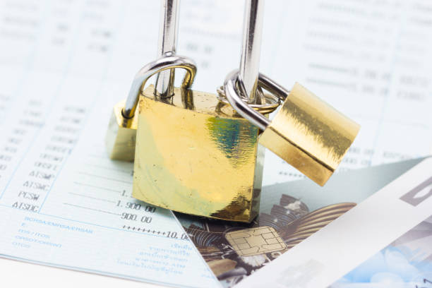 istock Credit card data security concept padlock with book bank 813141106