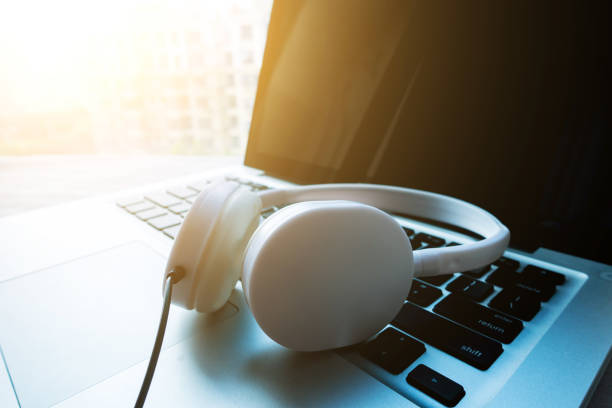 istock Headphones with laptop 813155278