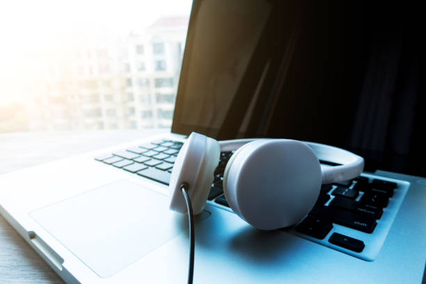 istock Headphones with laptop 813155282