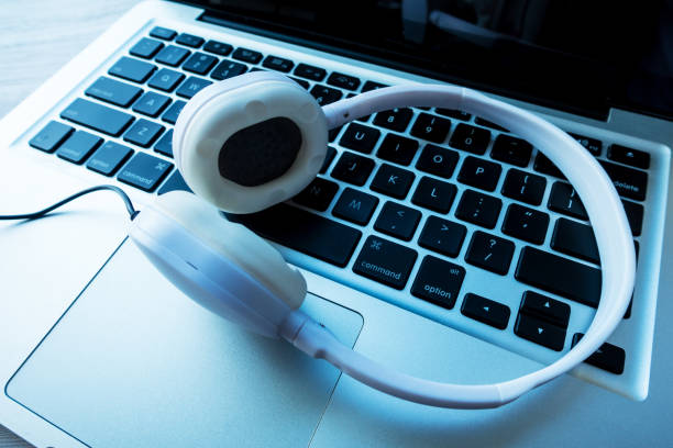 istock Headphones with laptop 813155444